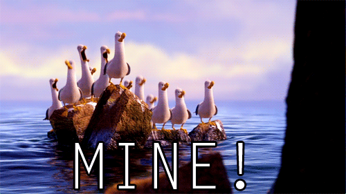 Animated gif of the seagulls from Finding Nemo standing on a rock in the sea all shouting "Mine!"